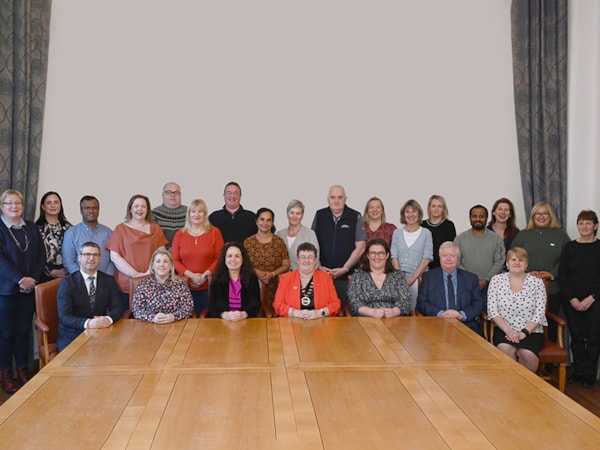 group of people at a board table